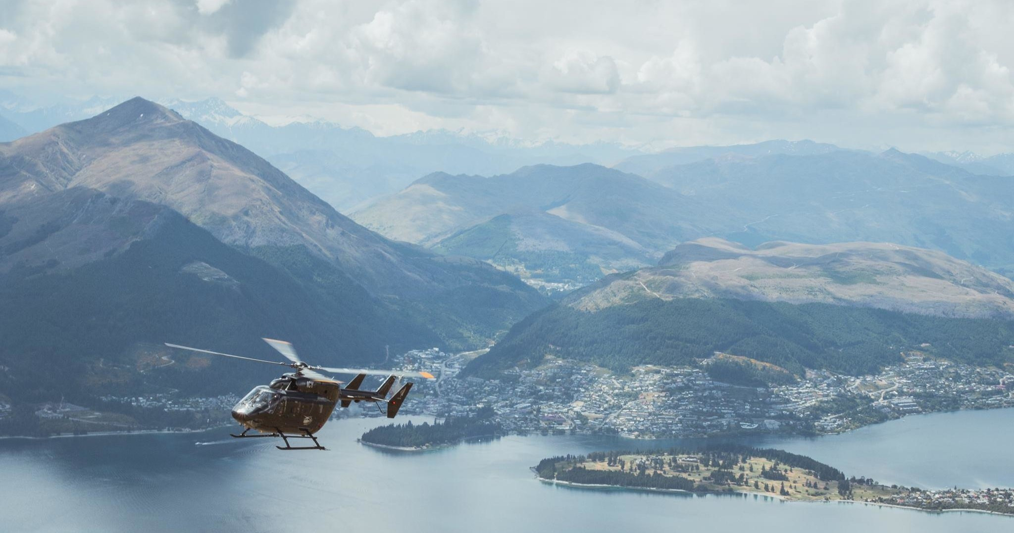 Soar above the majestic Southern Alps as you explore ancient valleys and sparkling alpine lakes witnessing the grandeur of Milford Sound's cliffs and waterfalls from the sky.